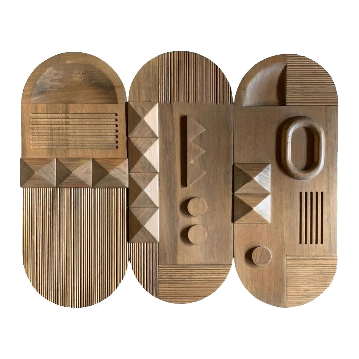 Wooden abstract sculpture with geometric patterns on a white background