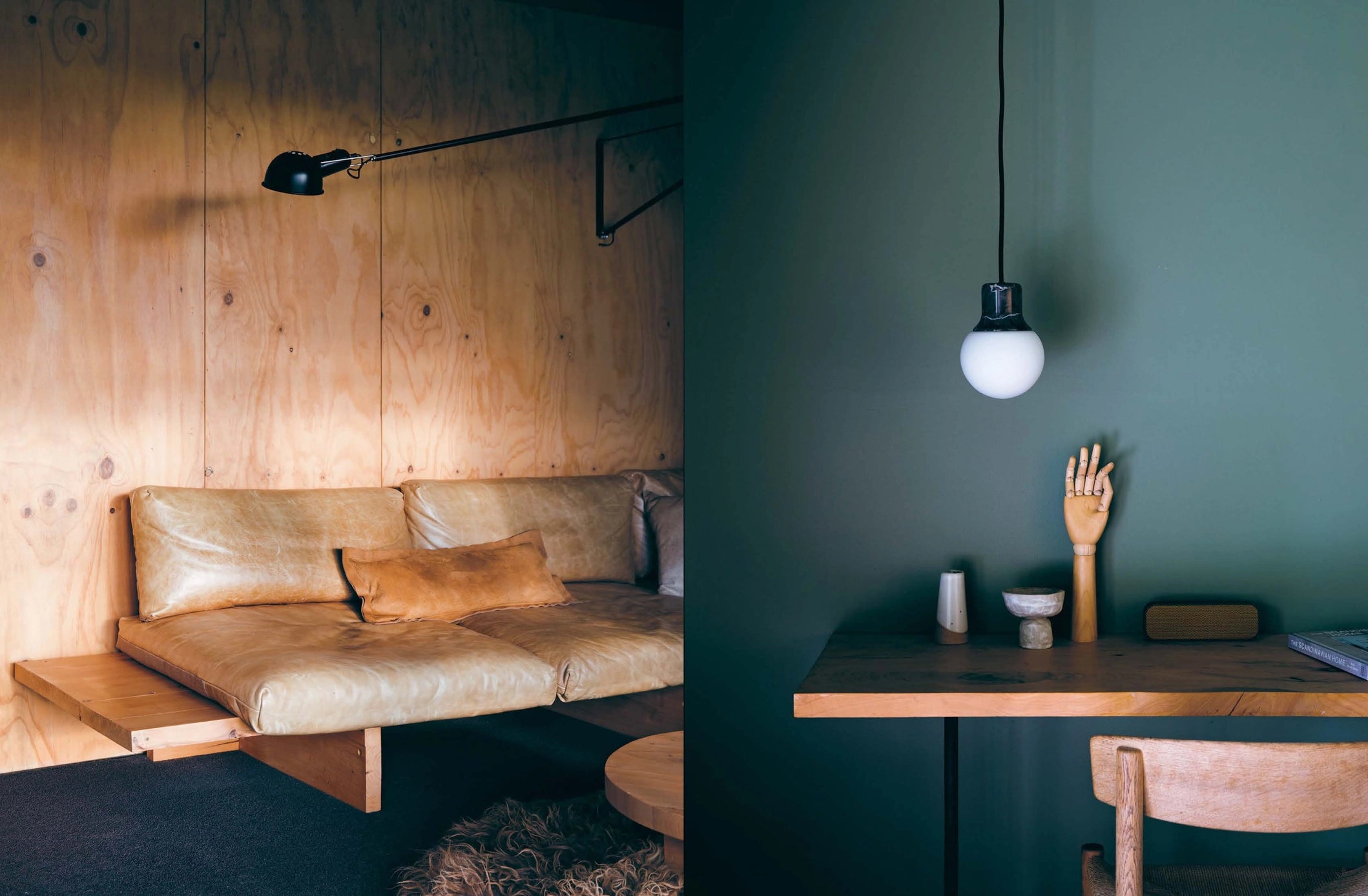Two interior design scenes: a wooden sofa against a wooden wall and a dining area with a table and hand sculpture.