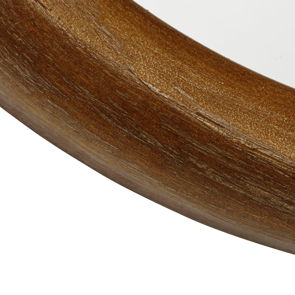 Close-up of a brown wooden mirror on a white background