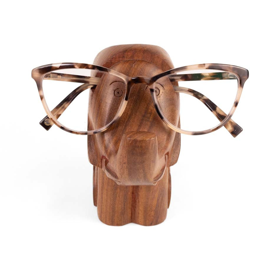 Wooden elephant glasses holder with glasses on a white background