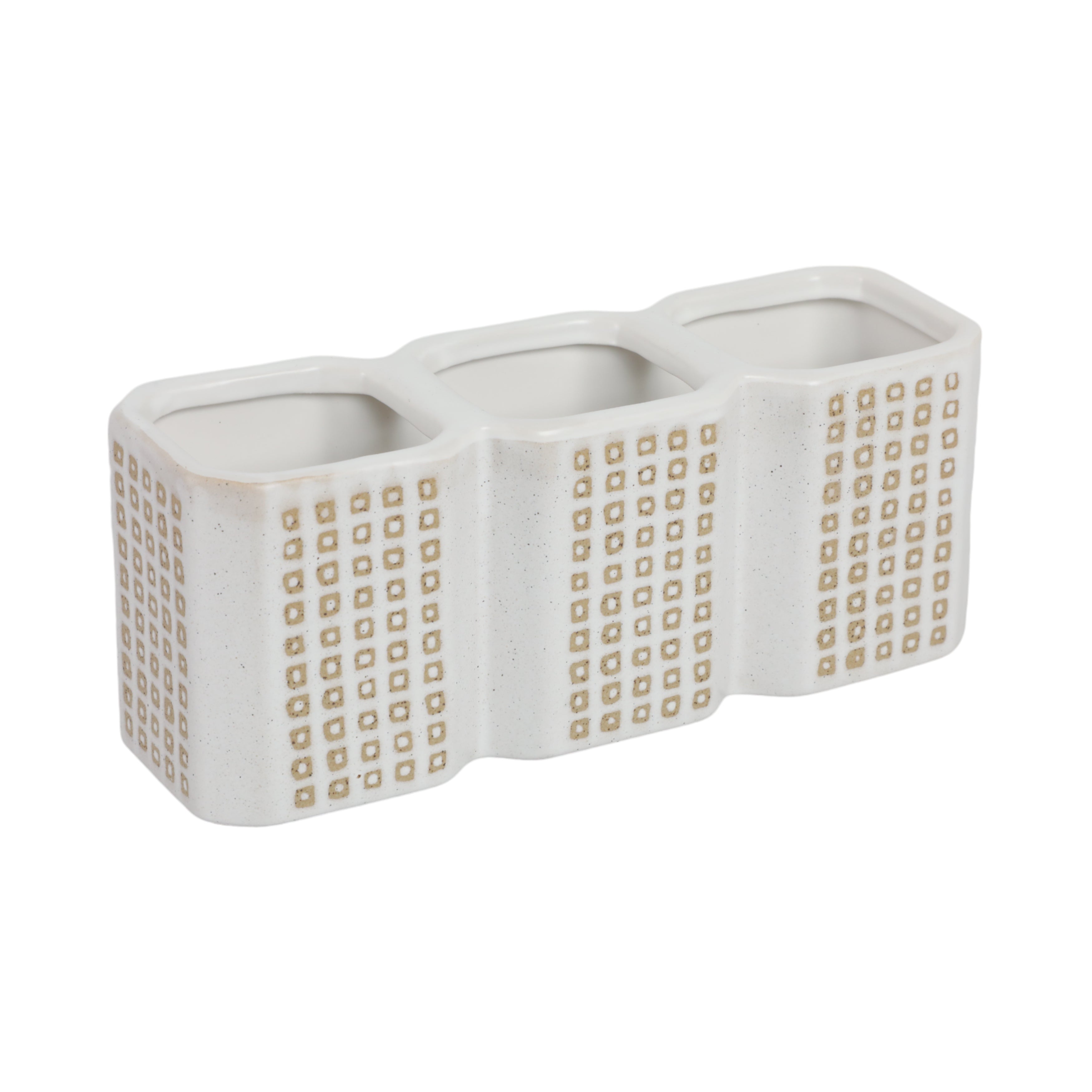 White ceramic three-compartment holder with gold geometric pattern on a white background