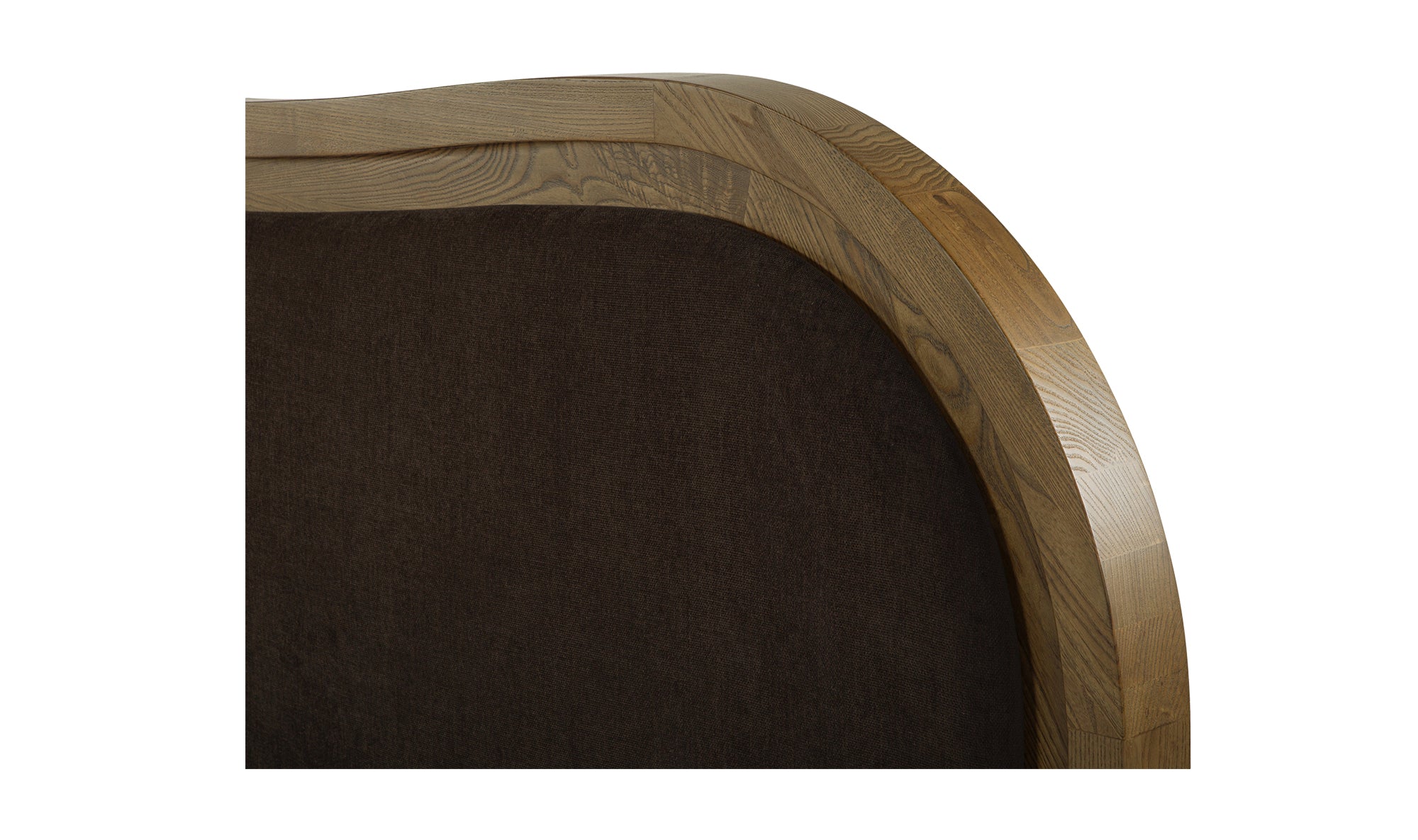 Close-up view of the Camilla Bed with a warm brown upholstered headboard