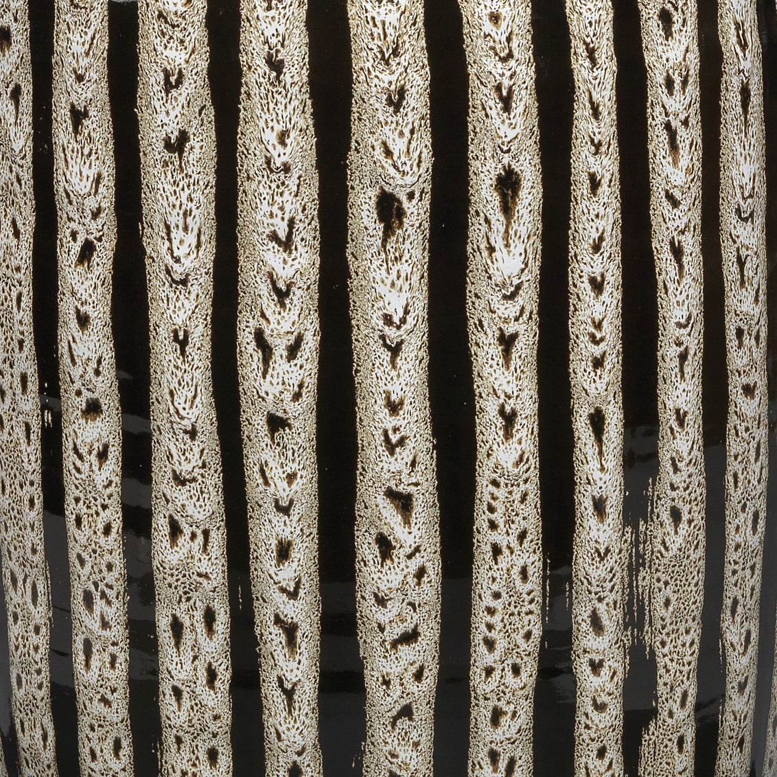 Close-up of a textured metal surface with vertical slats