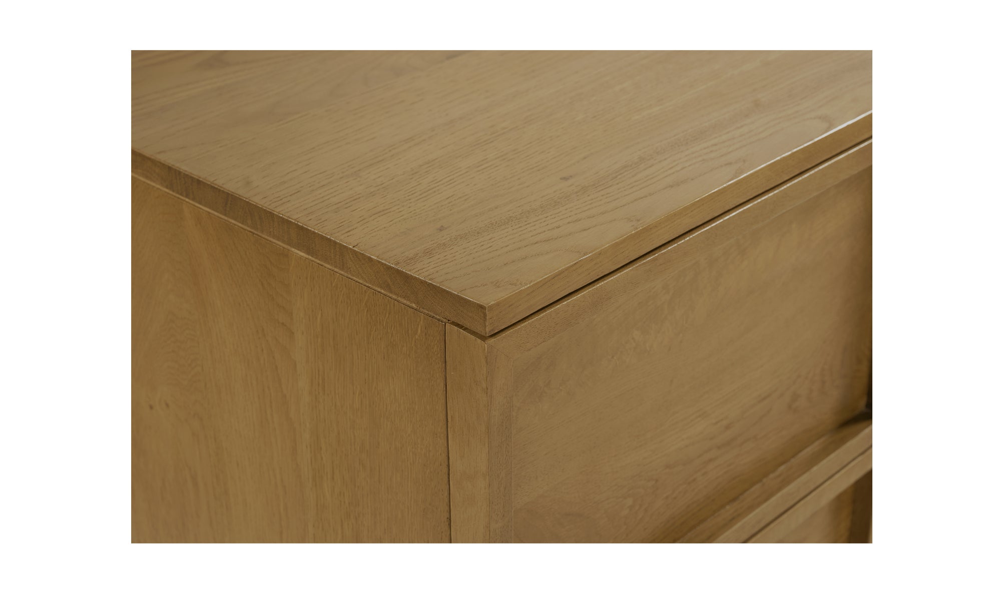 Close-up of a wooden drawer with a white background