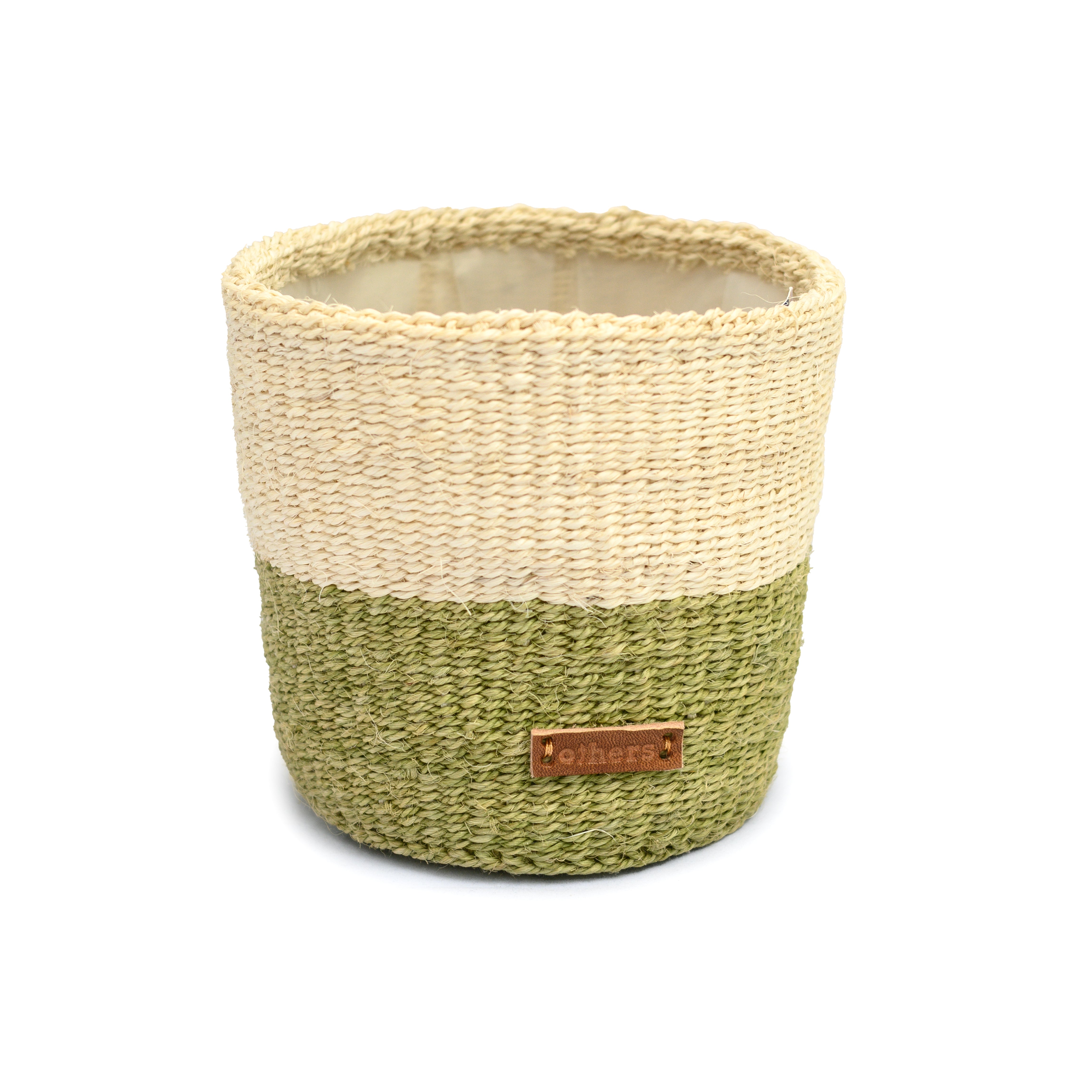 Woven basket with two-tone design on a white background