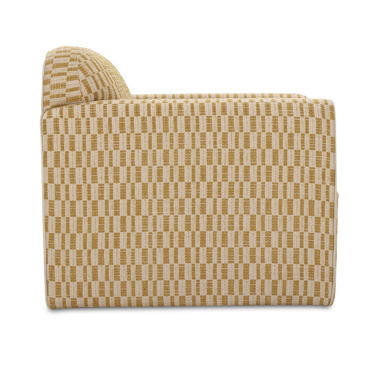 Patterned chartreuse armchair on a white background