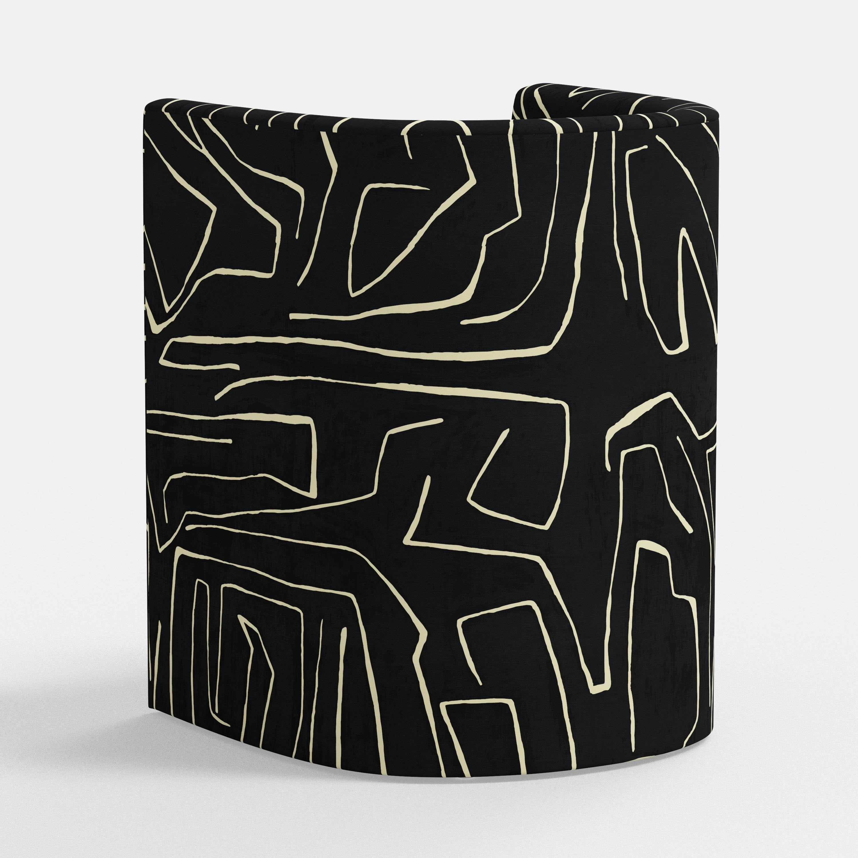 Black armchair with white abstract patterns on a white background