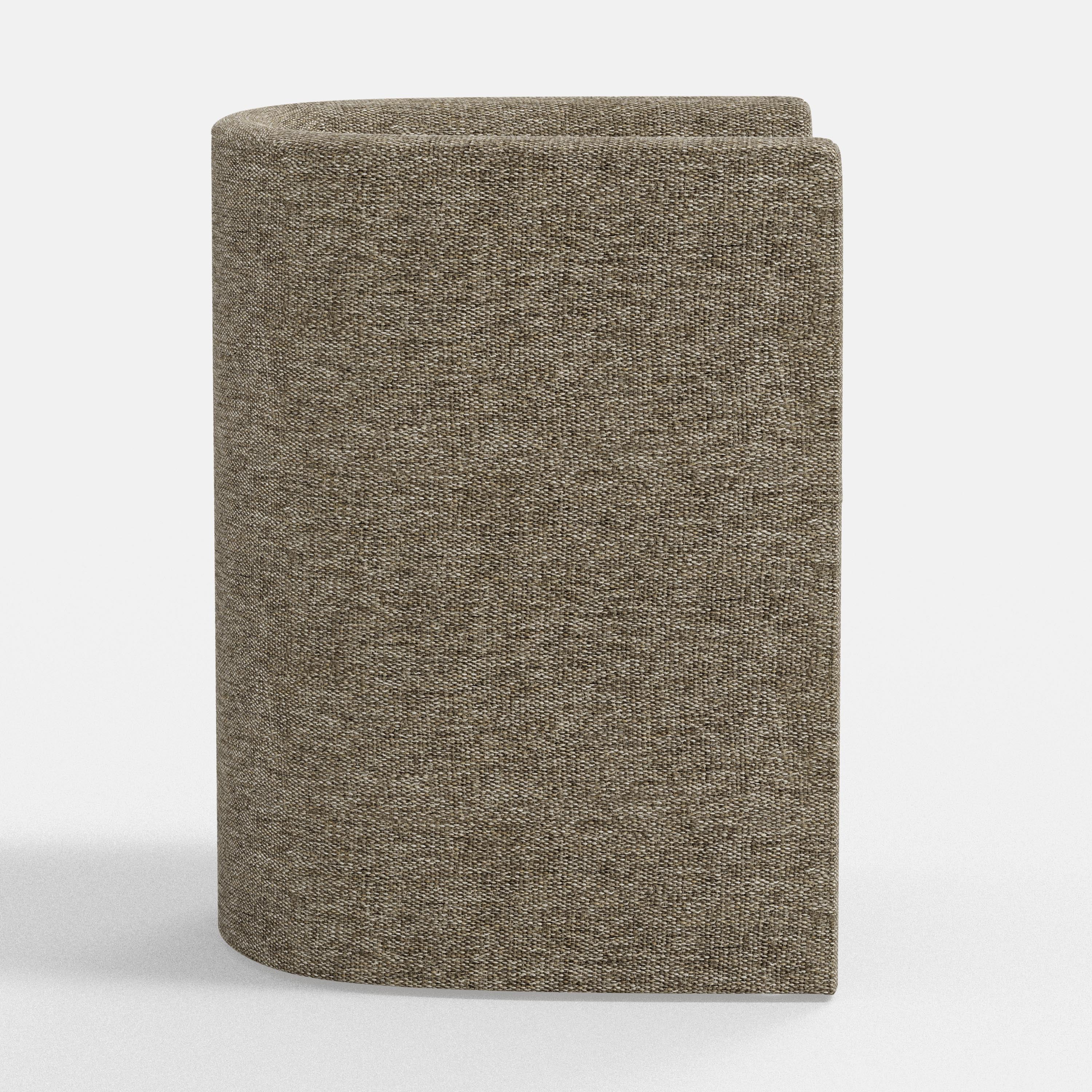 Grey textured armchair on a white background