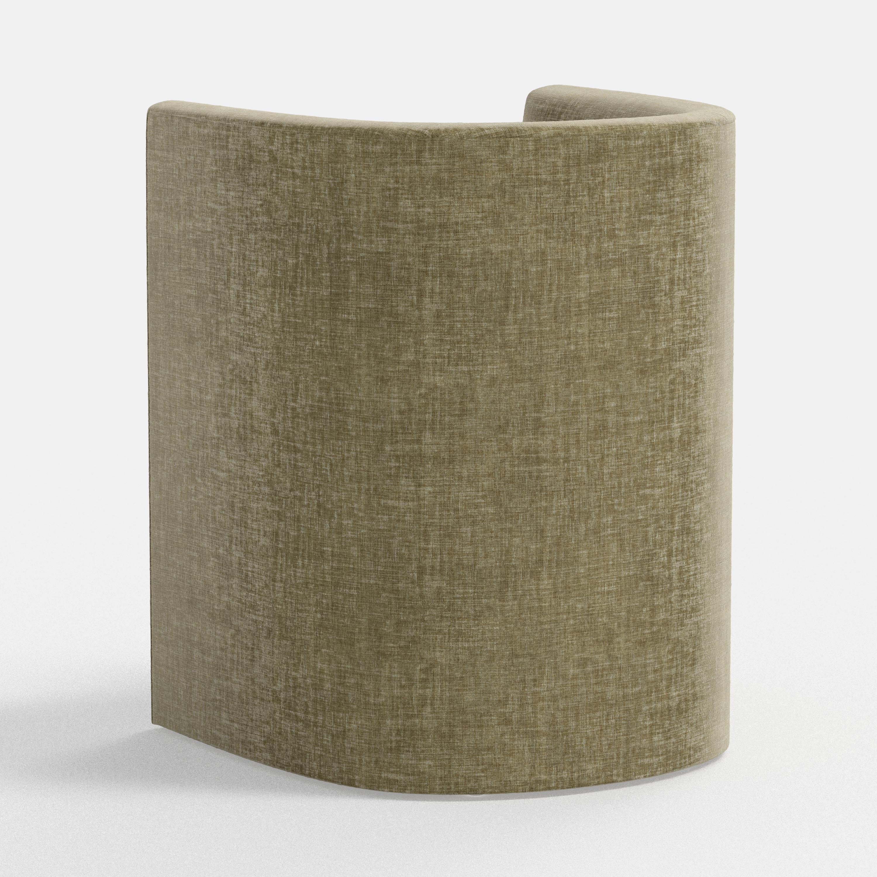 Textured green armchair on a white background