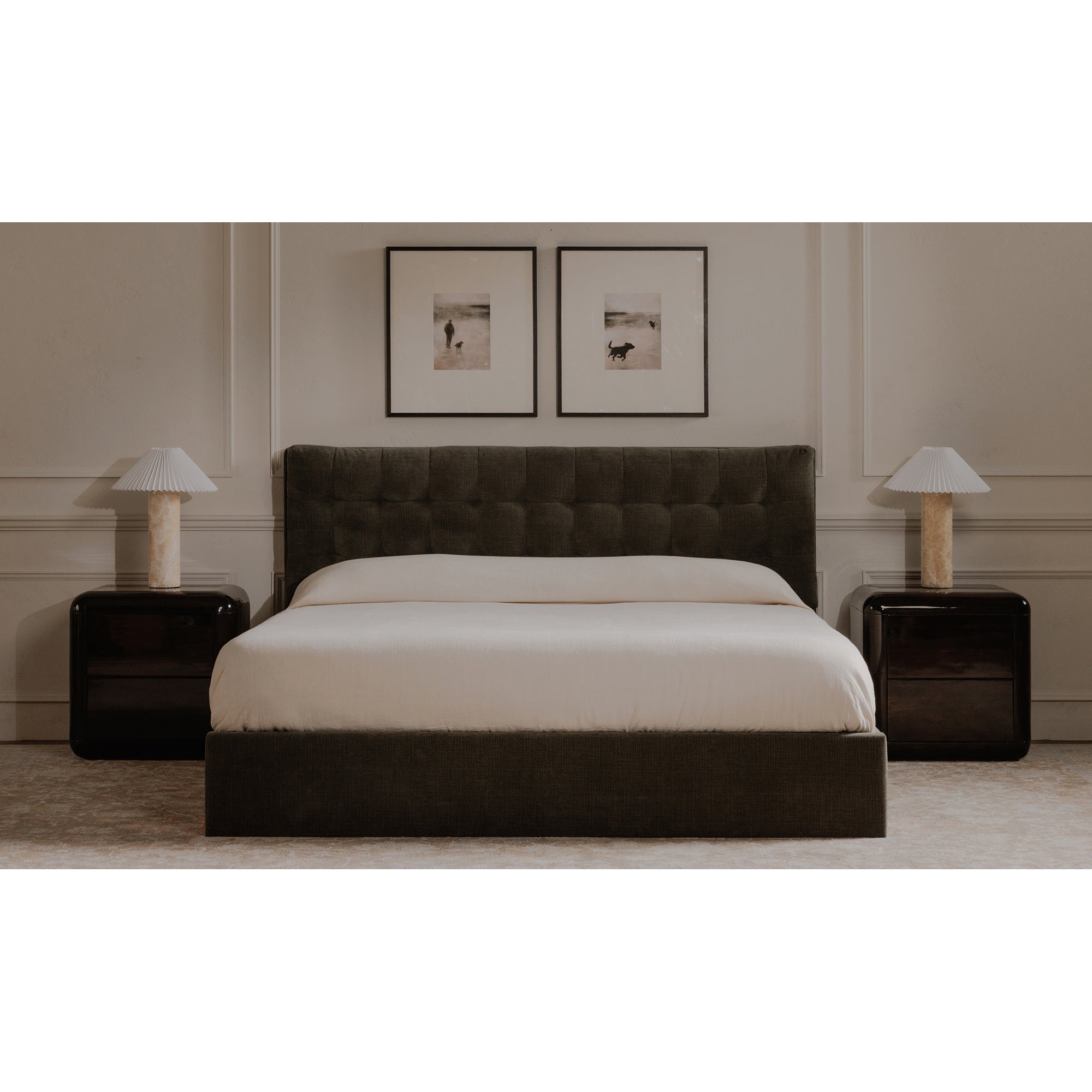 Modern bedroom with a brown upholstered bed, nightstands, and wall art.