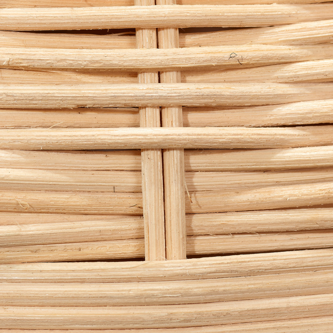 Close-up of woven rattan lamp base