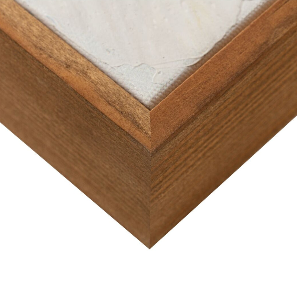 Wooden picture frame corner on a white background