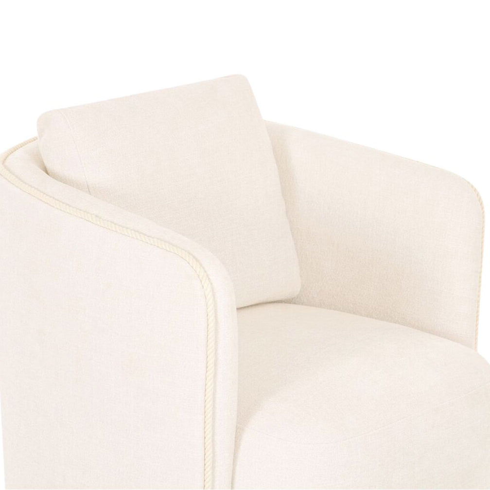 Close-up of a white armchair on a white background