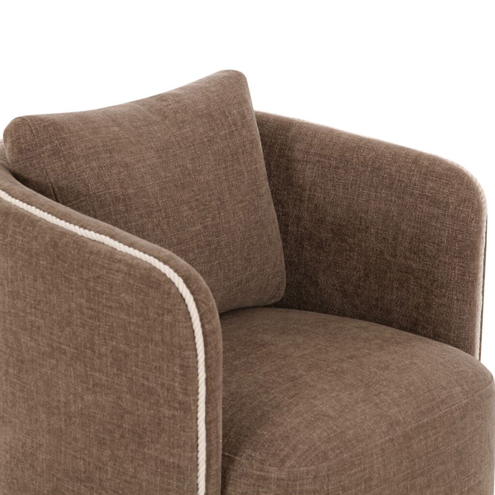 Brown upholstered chair with a white trim on a white background
