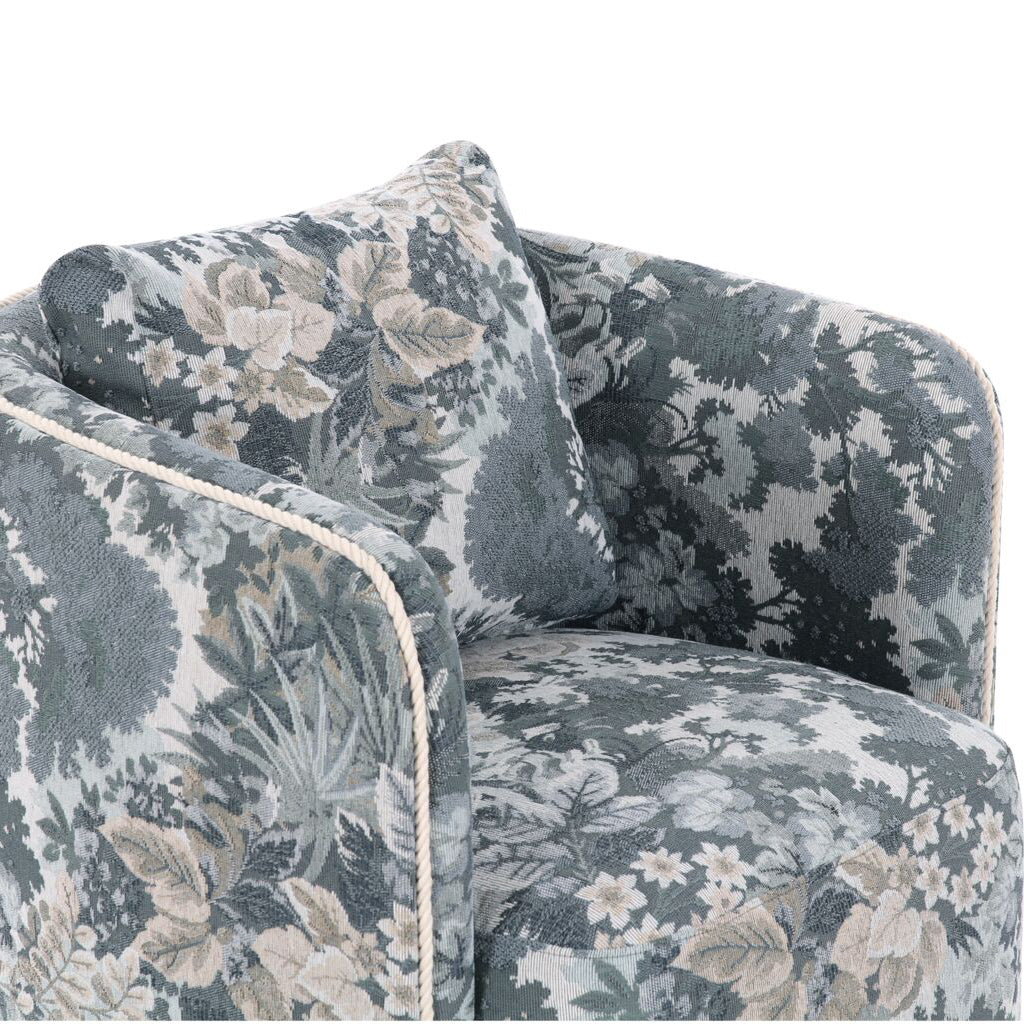 Floral patterned armchair on a white background