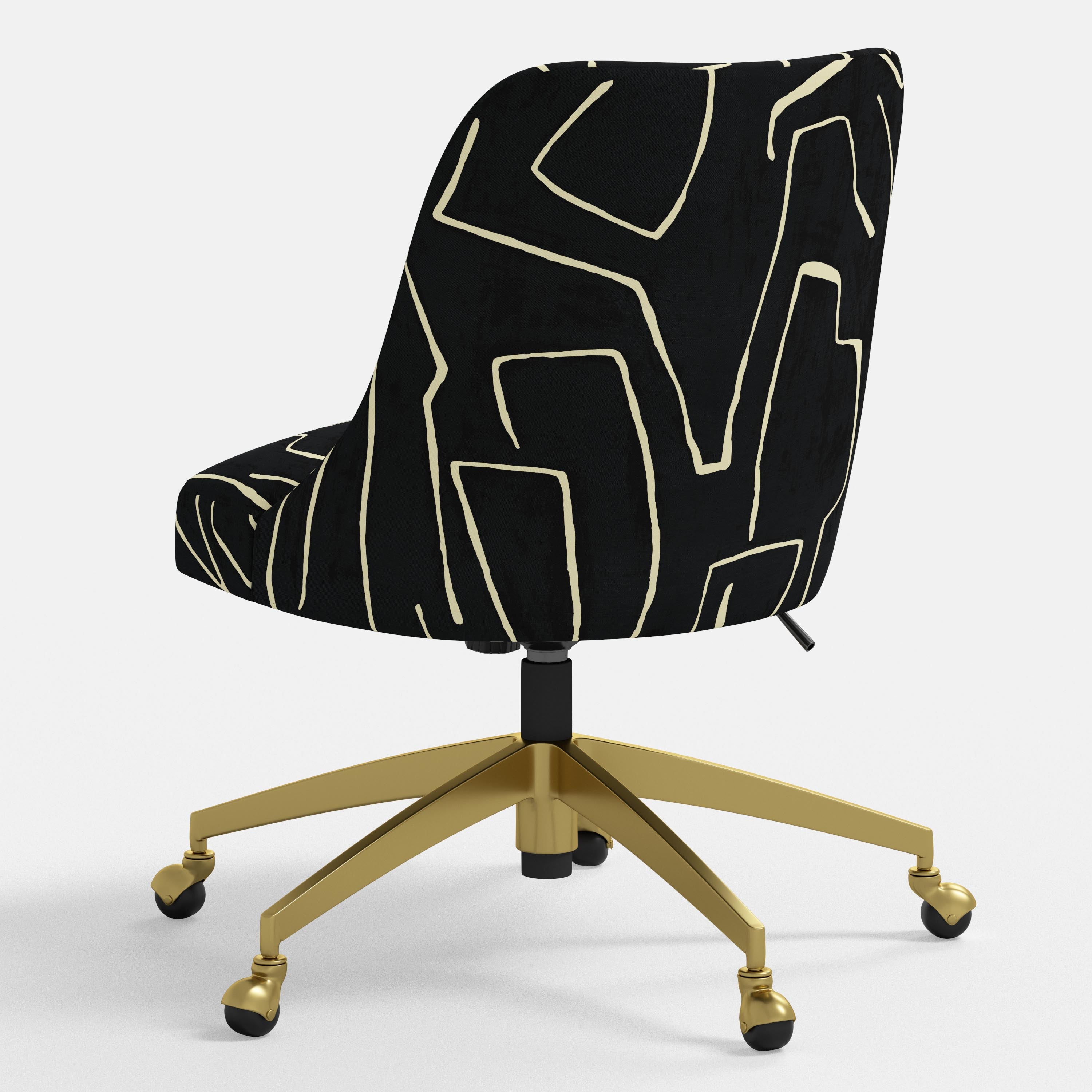 Black office chair with gold accents on a white background