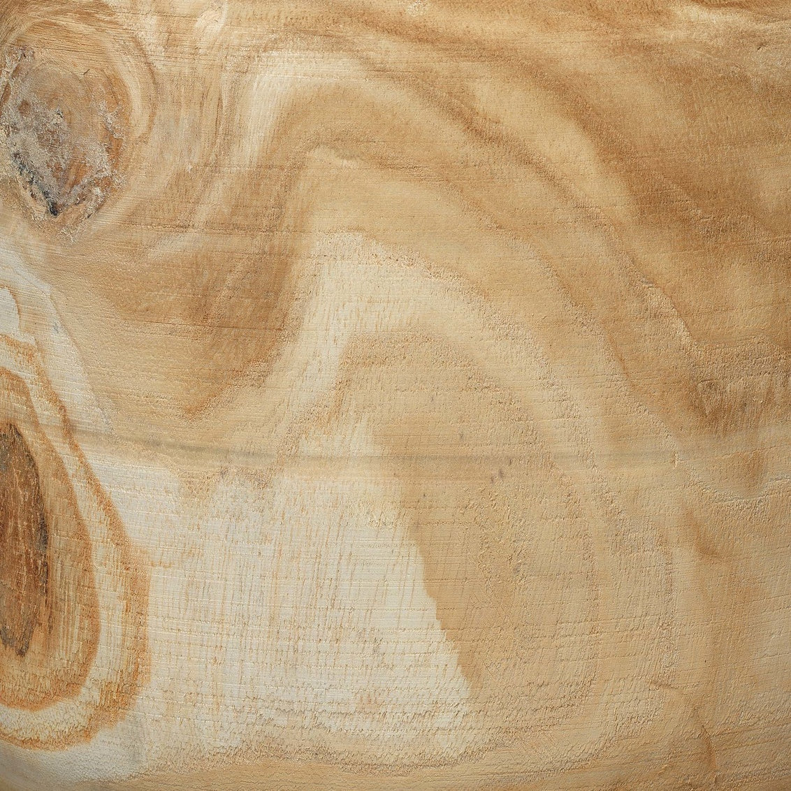 Close-up of a wooden surface with visible grain and texture