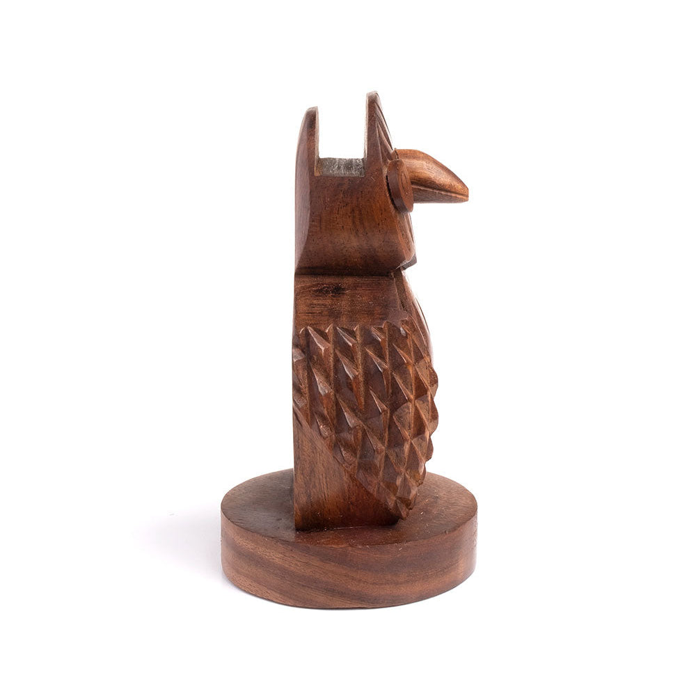 Wooden owl-shaped eyeglasses holder on a white background