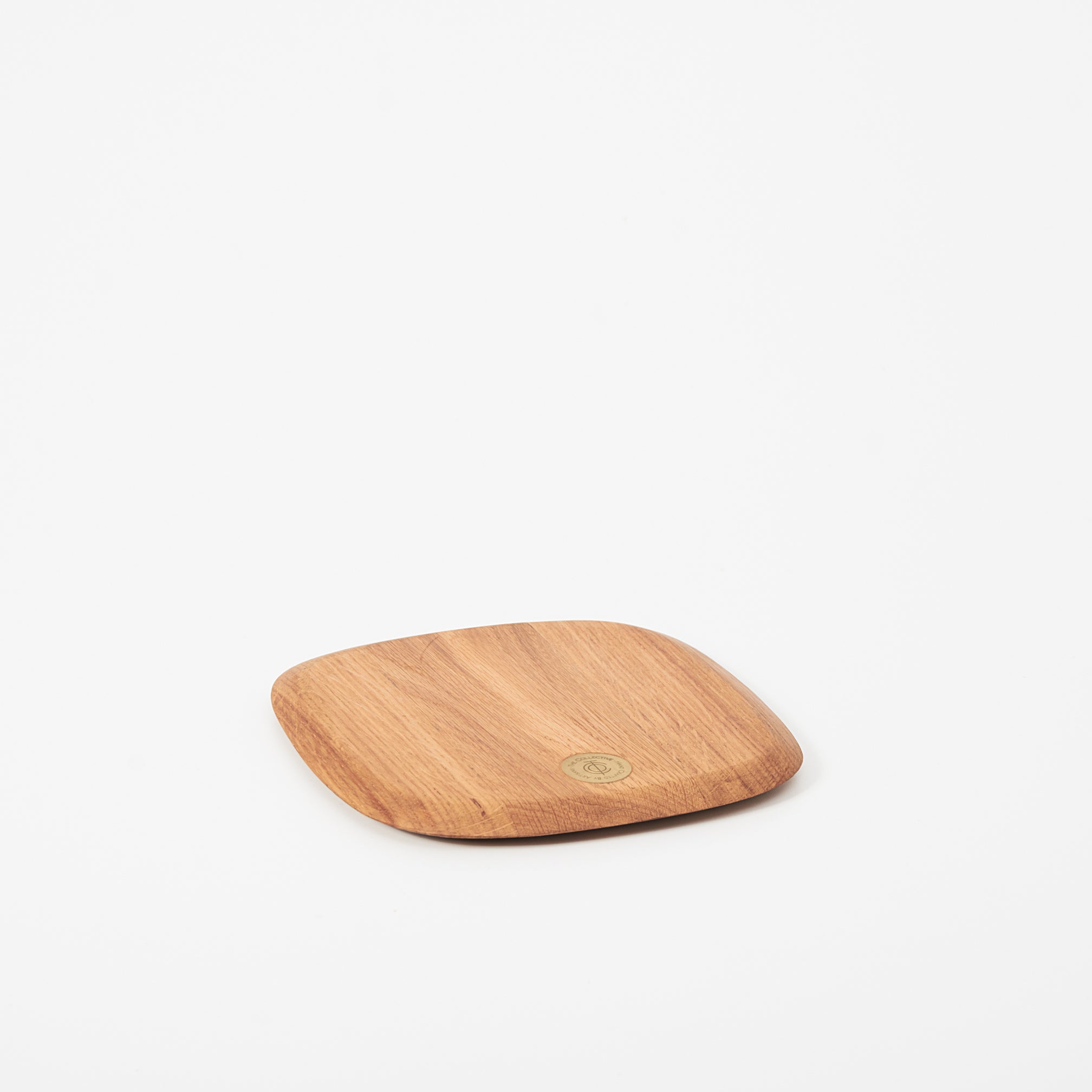 Wooden serving board on a white background