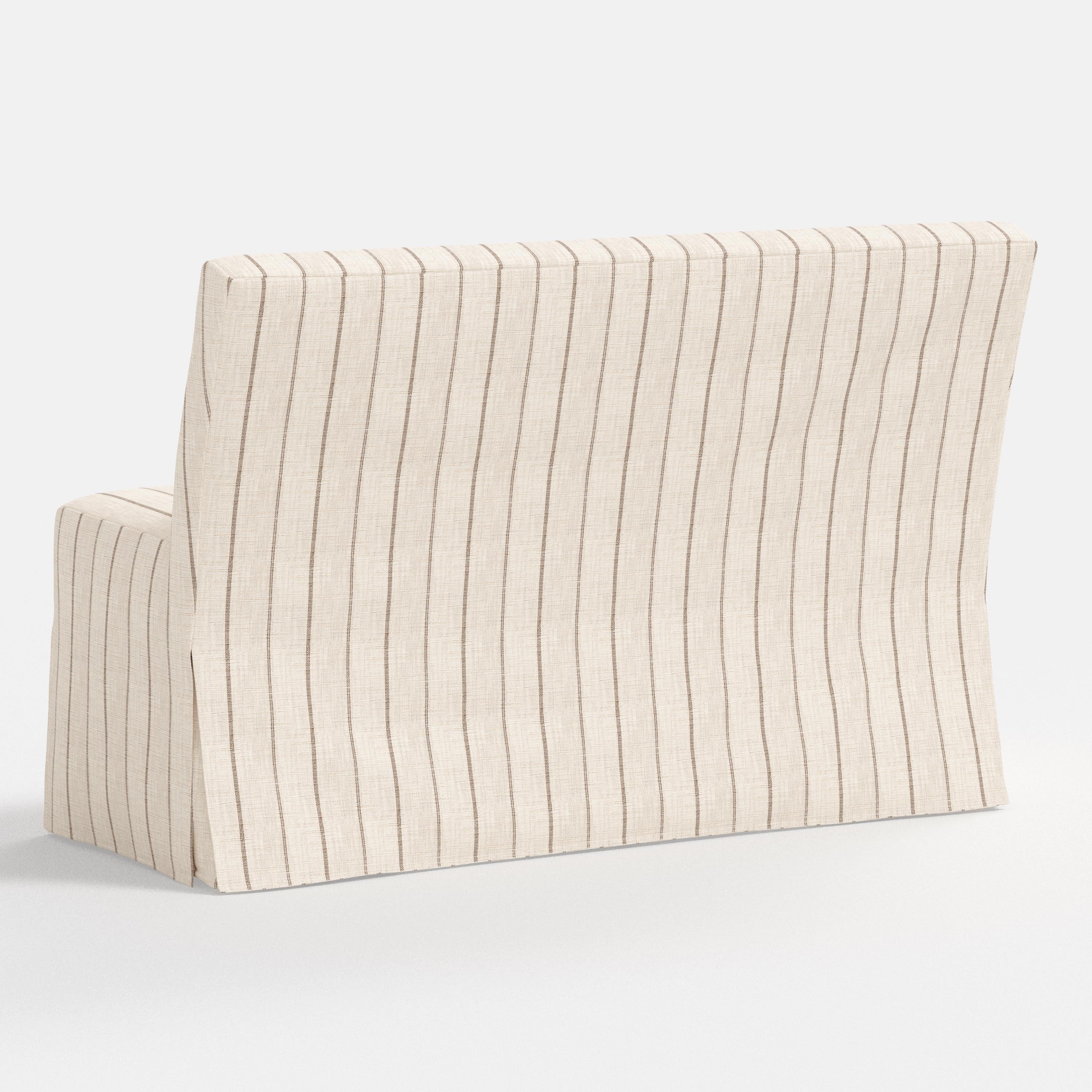Beige striped sofa on a white background