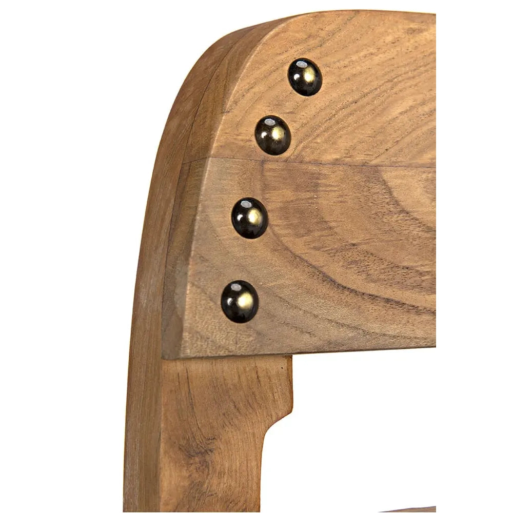 Wooden chair arm with four metallic knobs on a white background
