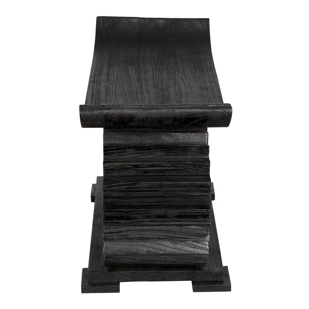 Black wooden stool with a textured surface on a white background