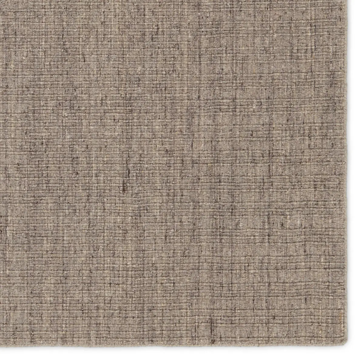 Textured brown fabric swatch on a white background