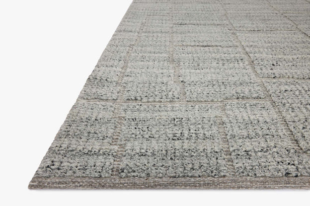 Textured gray rug on a white background