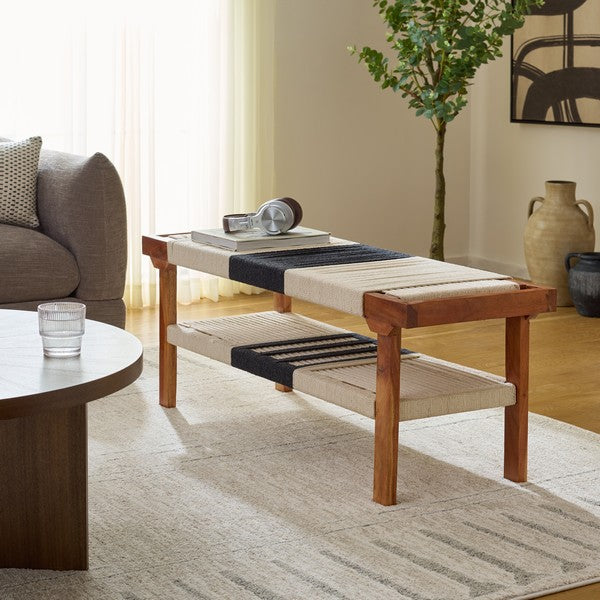 Wooden coffee table with woven surface in a living room setting
