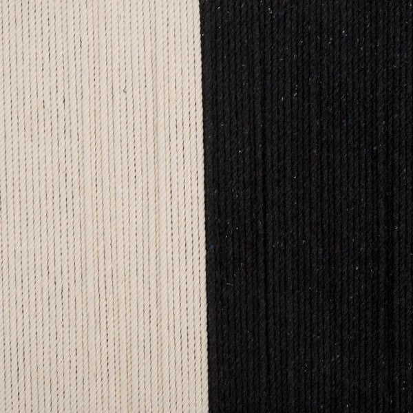 Close-up of black and beige fabric texture