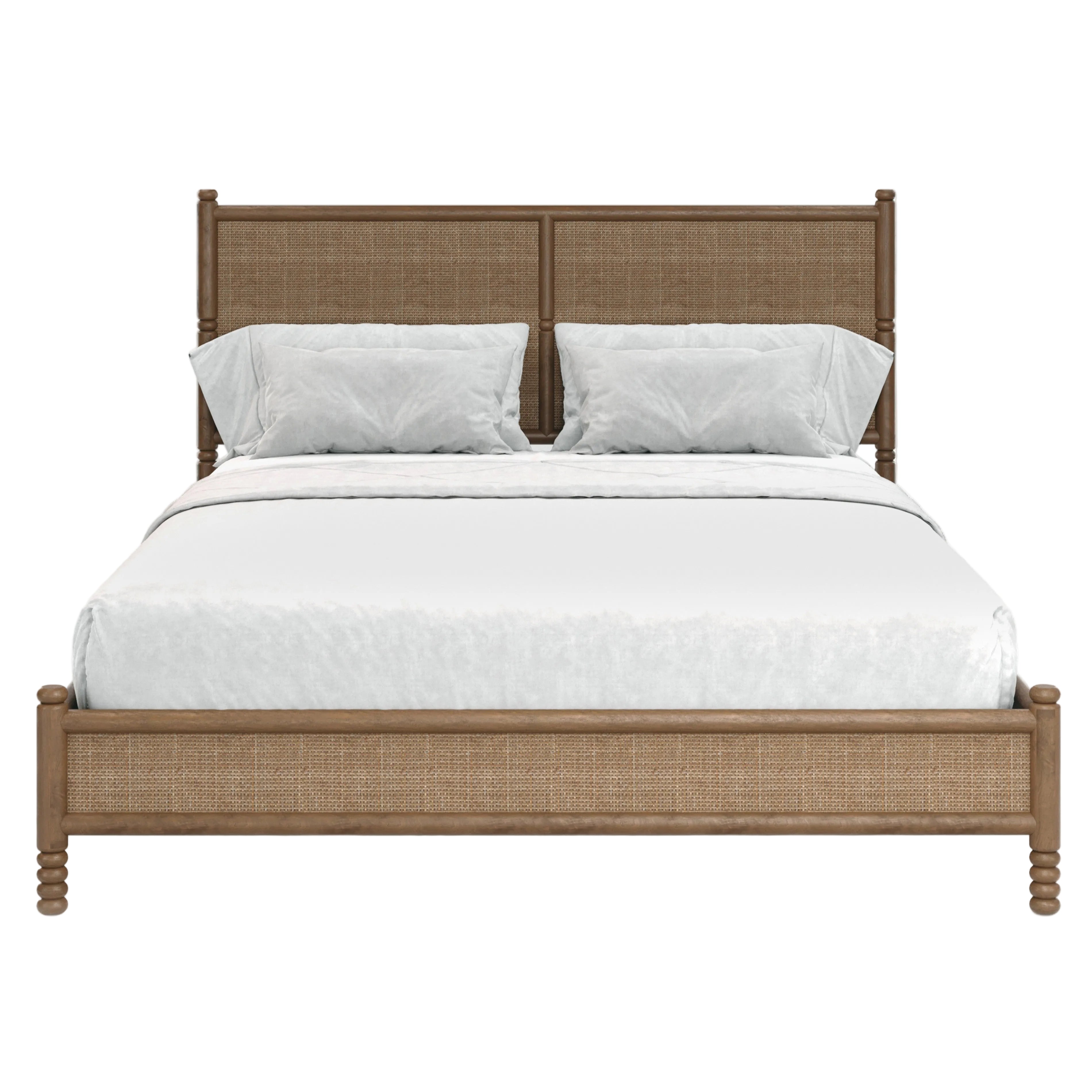 A queen-size bed with a light brown wooden frame and woven cane headboard and footboard, dressed in white bedding and two white pillows, shown against a plain white background.