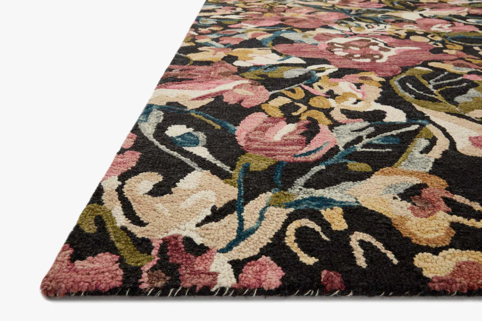 Floral patterned rug with black background
