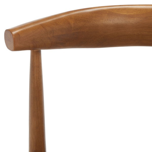 Close-up of a wooden chair arm on a white background