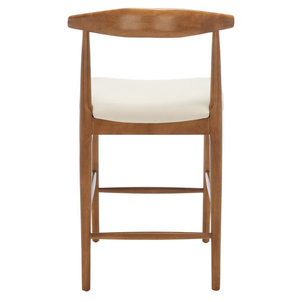 Wooden bar stool with a white cushion on a white background