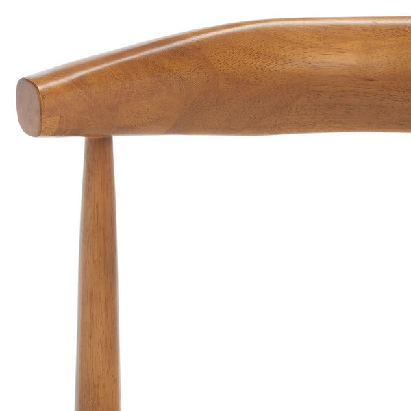 Close-up of a wooden chair arm on a white background