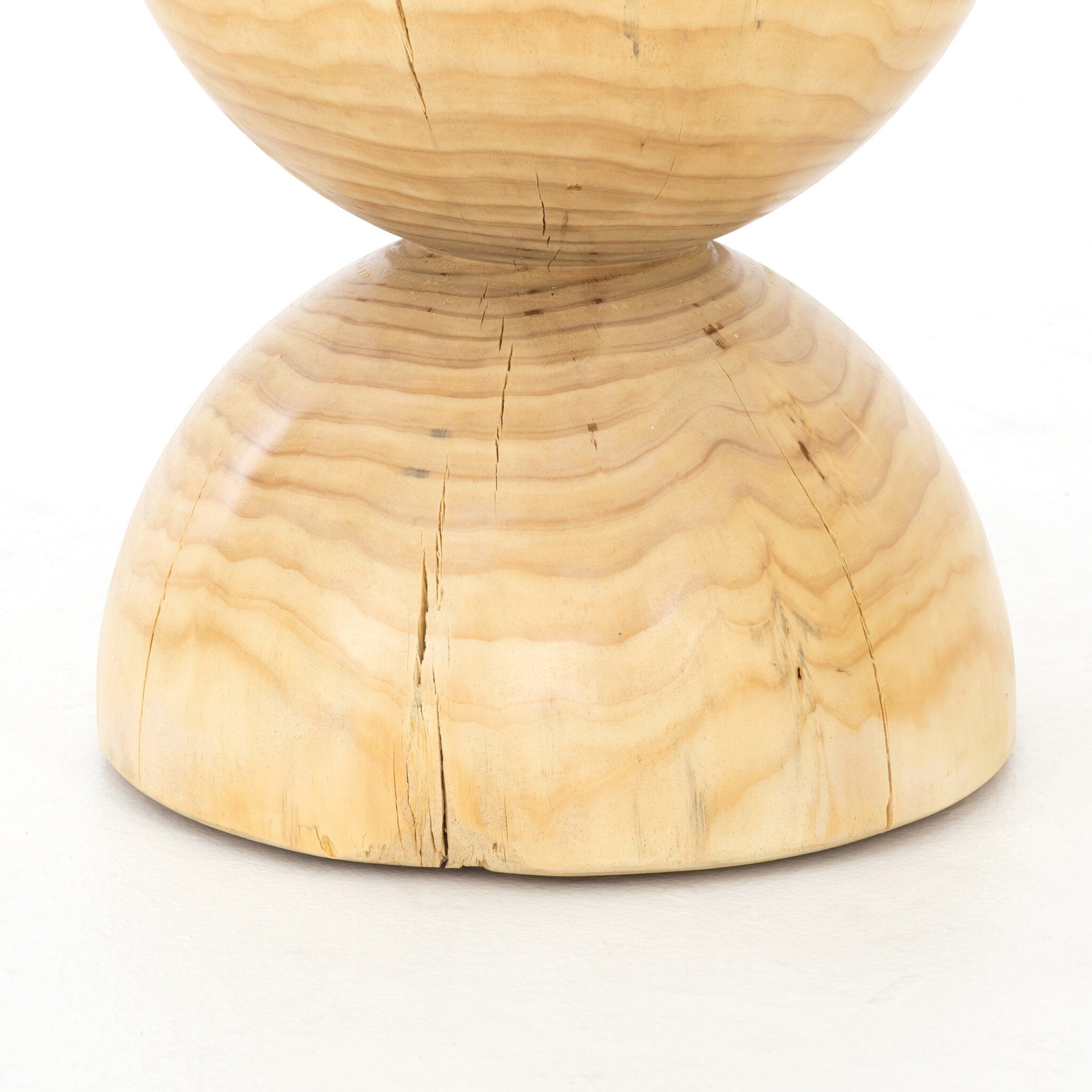 Wooden object with a spherical top and conical base on a white background