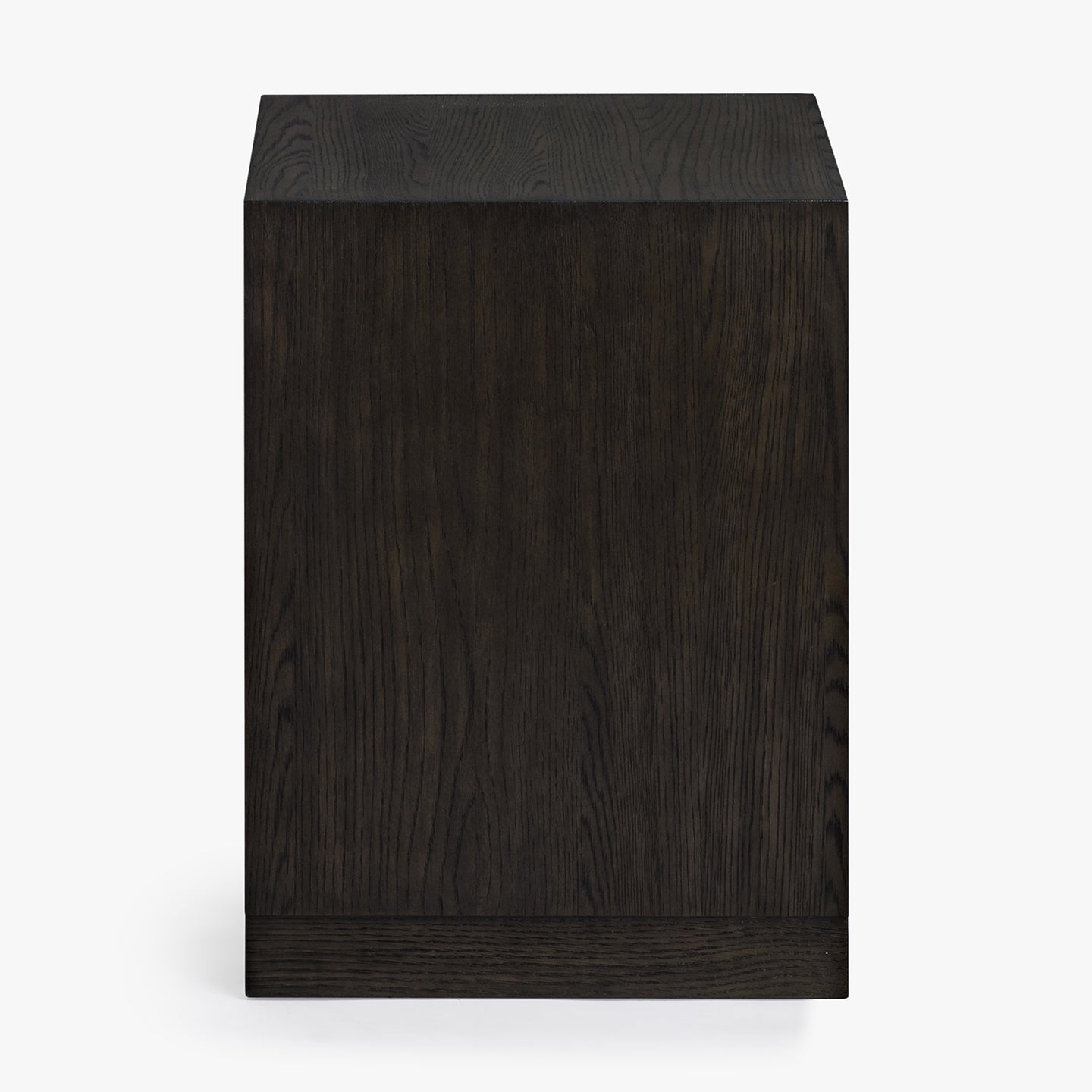 Side view of a dark wooden nightstand on a white background