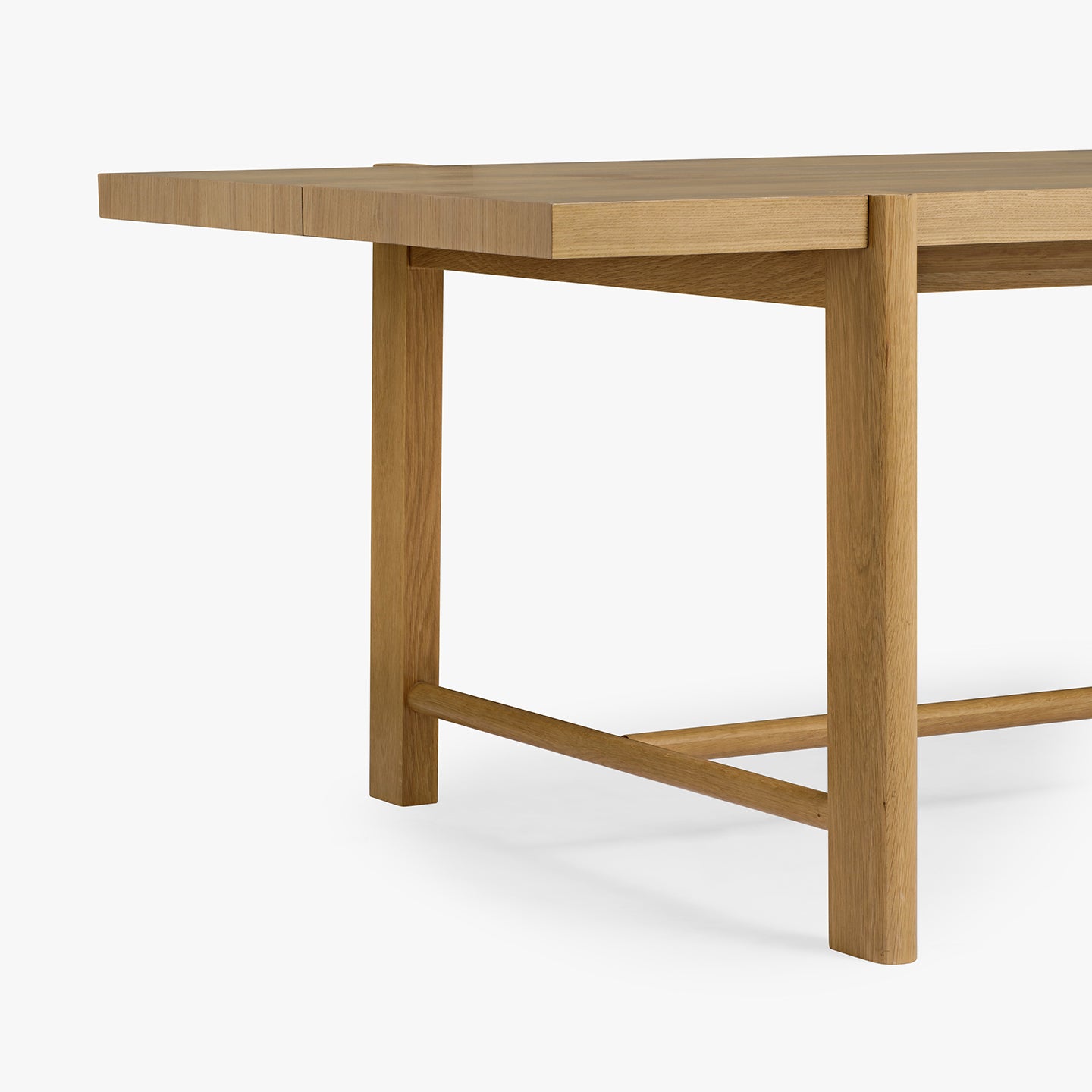 Wooden dining table on a white background