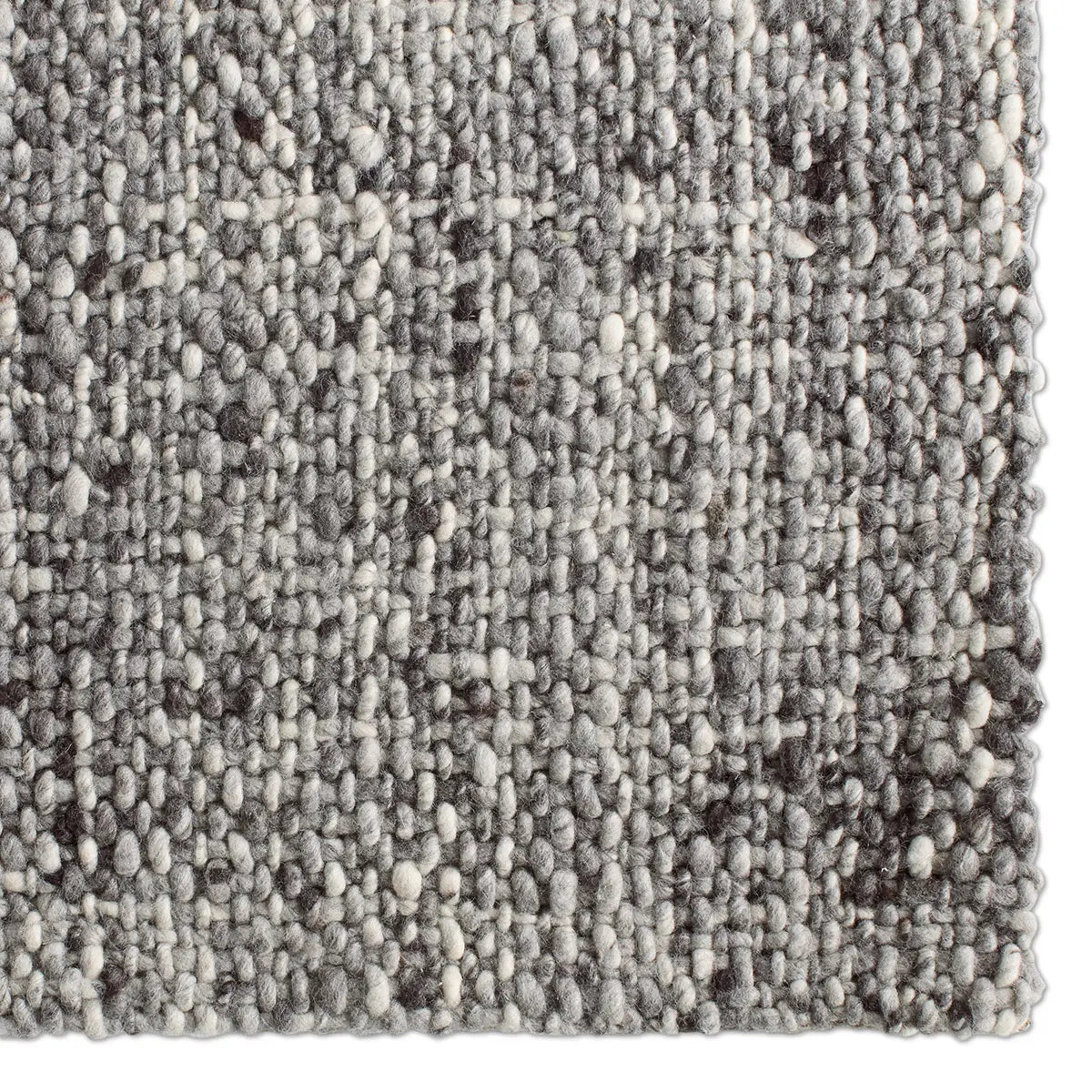 Close-up of a textured gray carpet