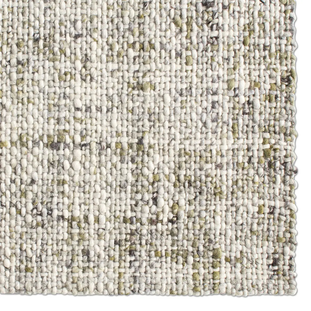 Close-up of a textured beige rug with a subtle pattern