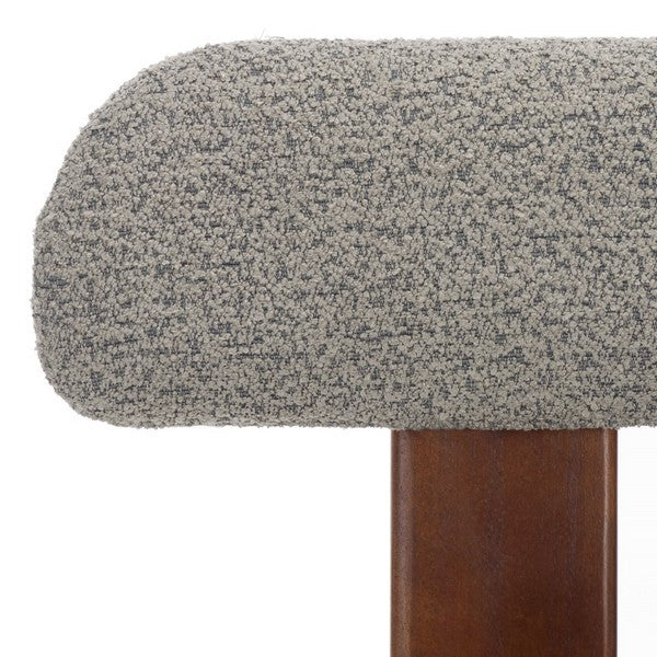 Chair with wooden frame and gray cushioned seat and backrest on a white background