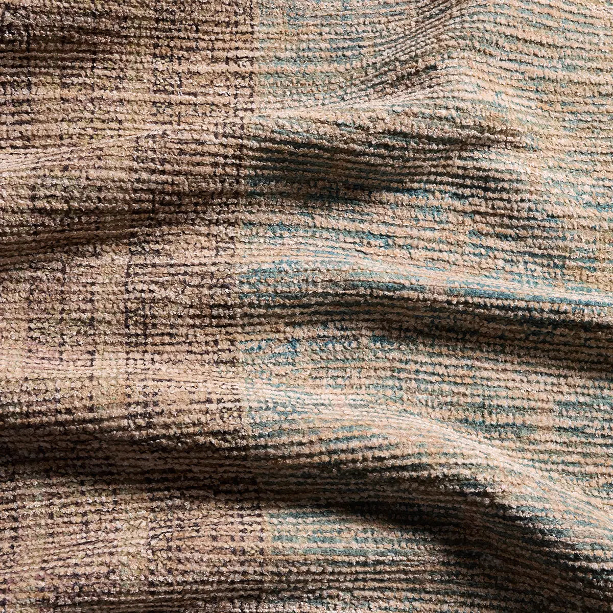 Close-up of textured brown fabric with subtle patterns