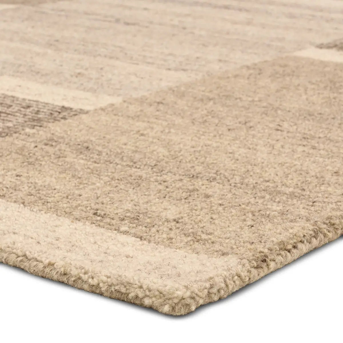 Beige woven rug on a white background