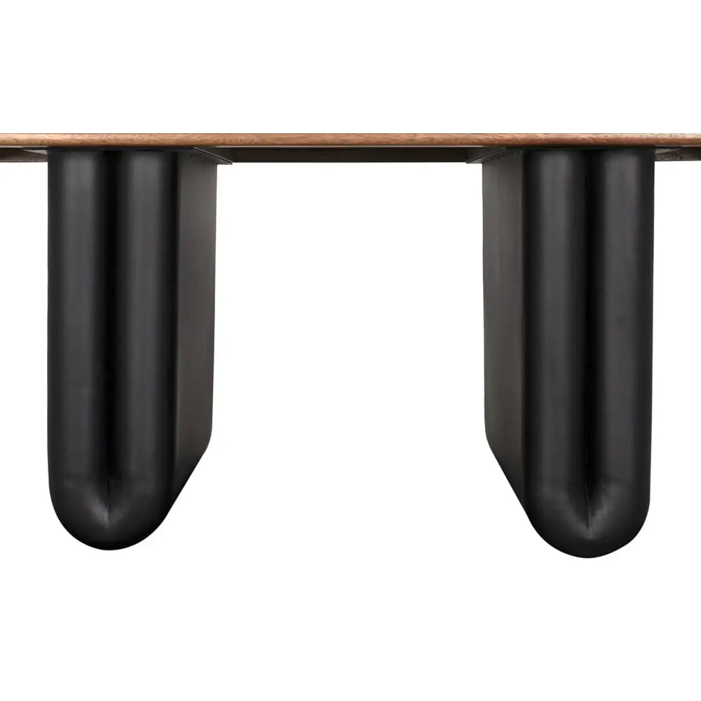 Close-up of a table with black metal legs on a white background