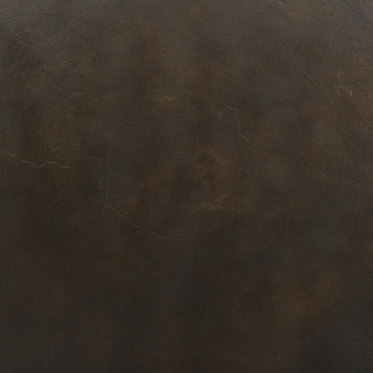 Close-up of dark brown leather texture
