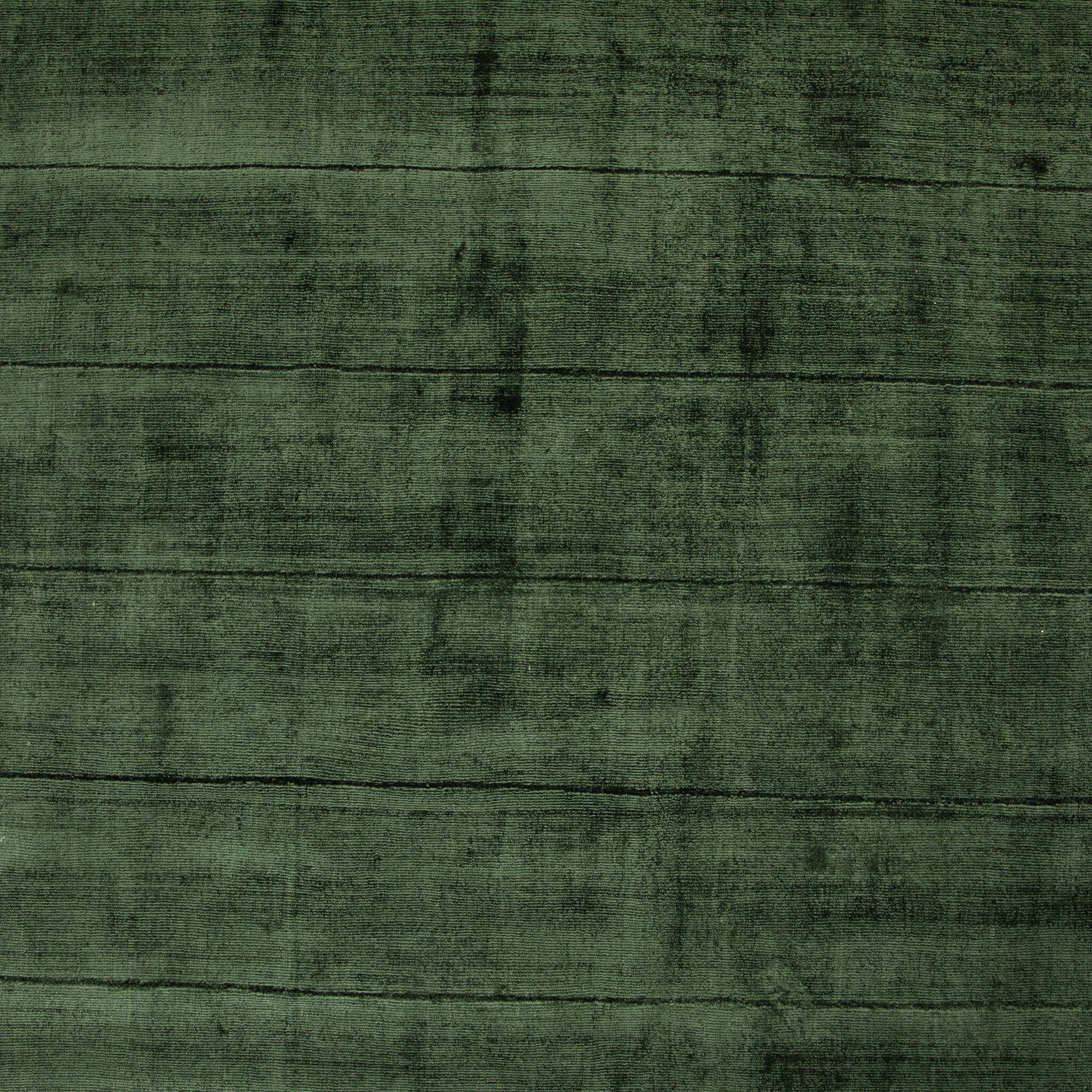 Textured green fabric pattern