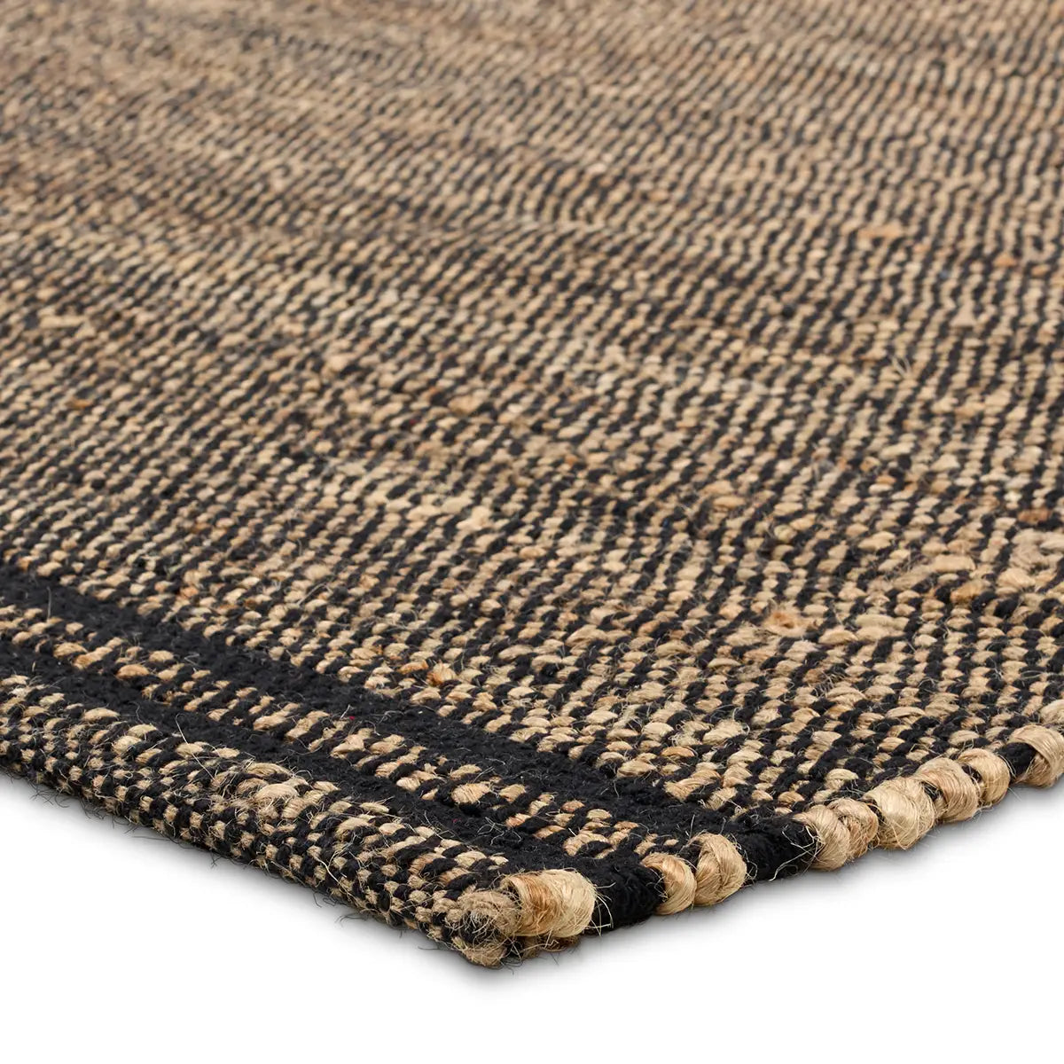 Close-up of a black and beige weaved rug