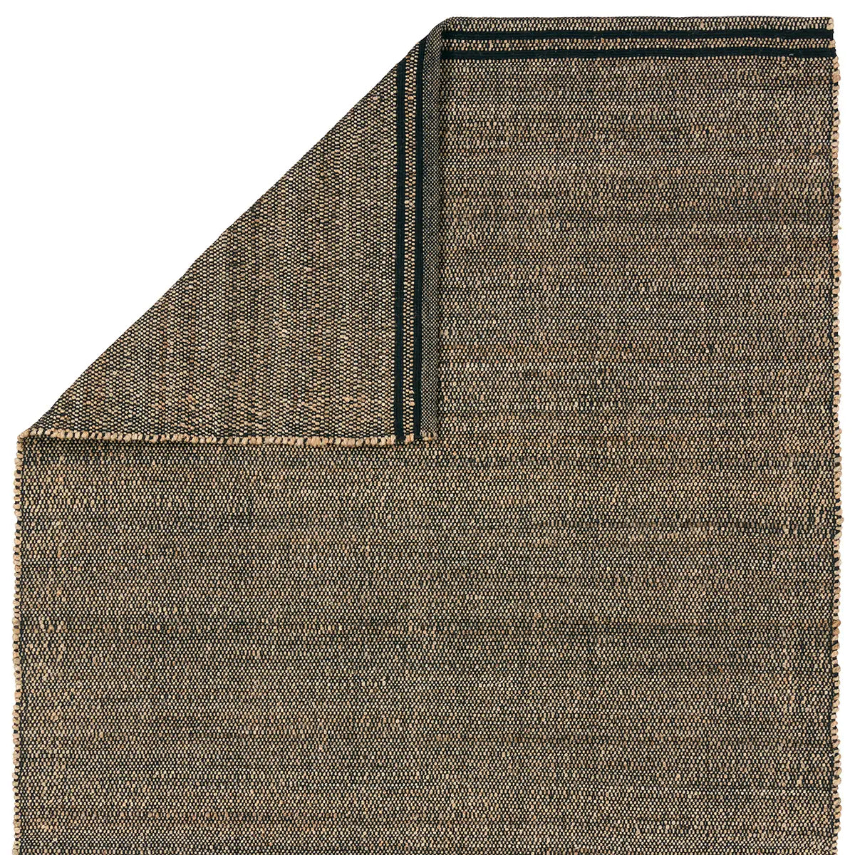 Close-up of a black and beige weaved rug