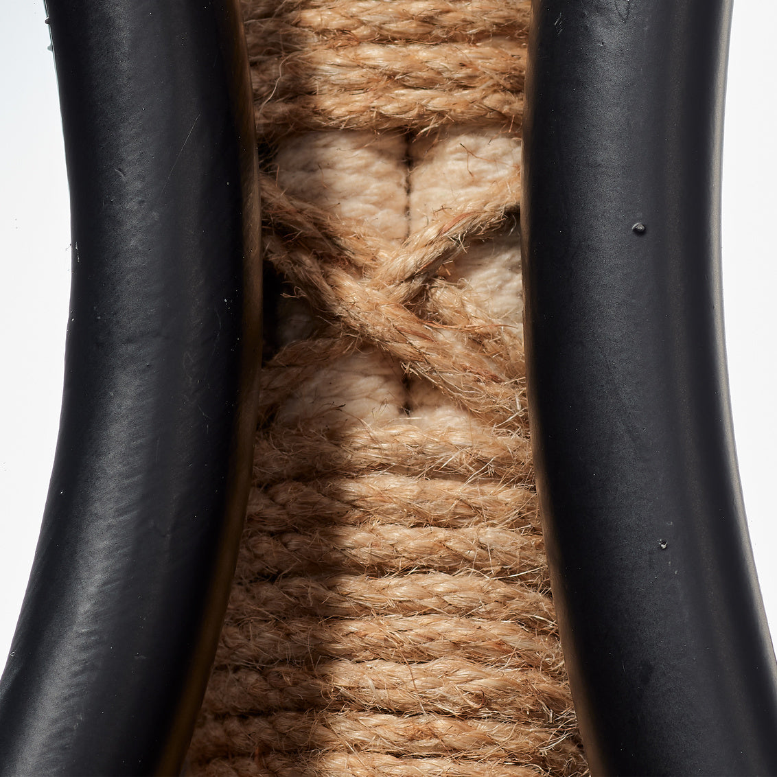 Decorative wall mirror with circular mirrors and rattan-like frame on a white background