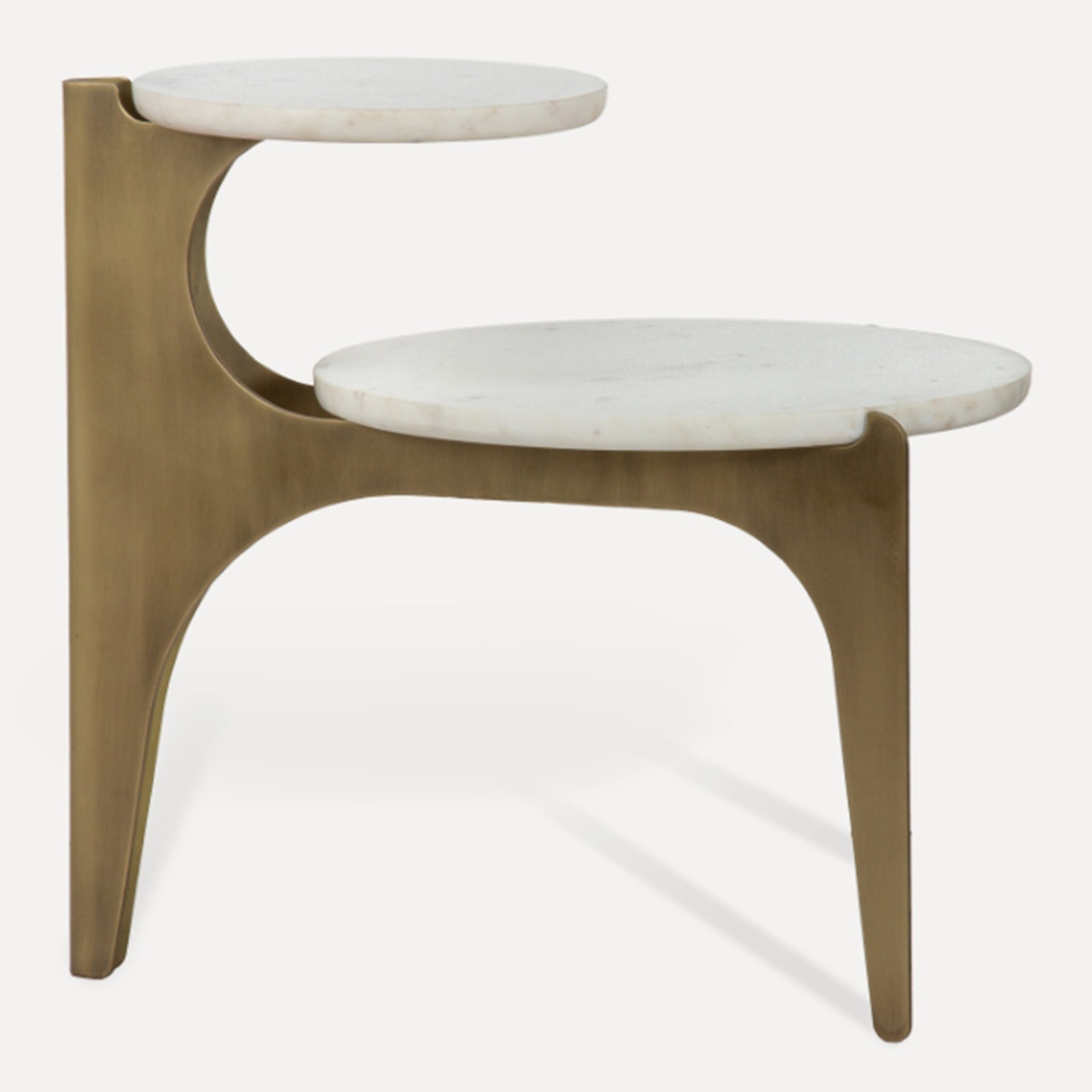 A modern two-tier side table featuring a curved, sculptural brass-finished metal frame with two round white marble tabletops, shown against a plain white background.